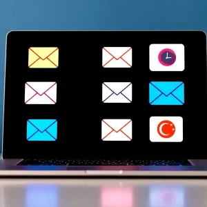 Visual representation of various email marketing services on a laptop.